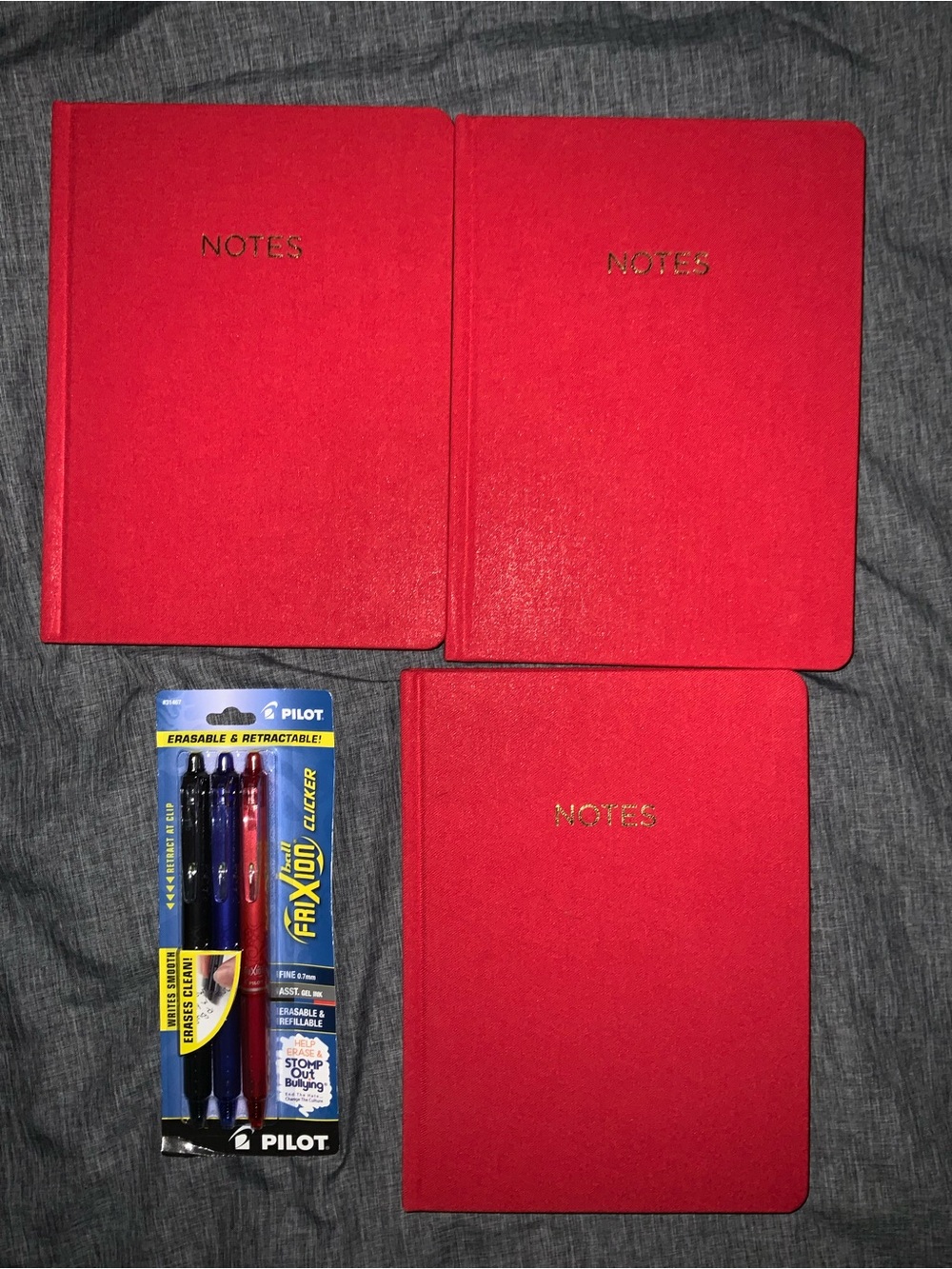 Red hard cover journals + Pens